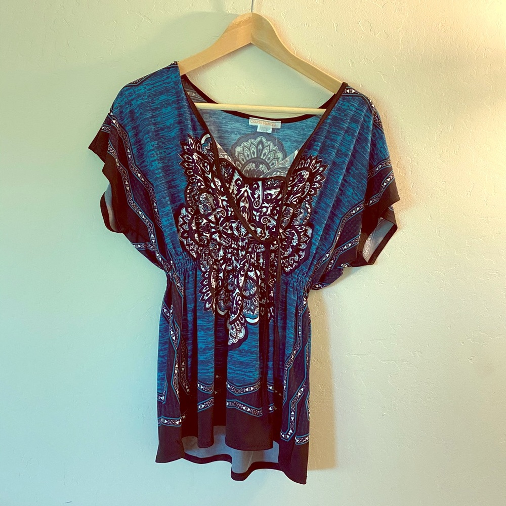 Claudia Richard blue top